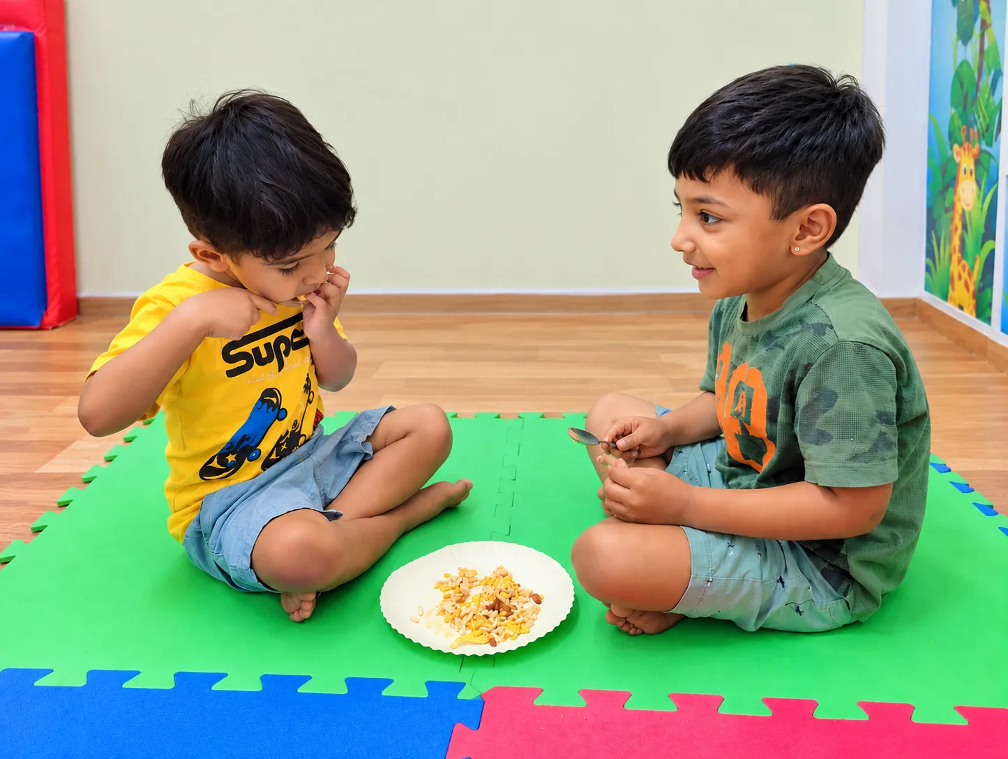 Children taking part in a feeding and self-care activity at OT Cloud.