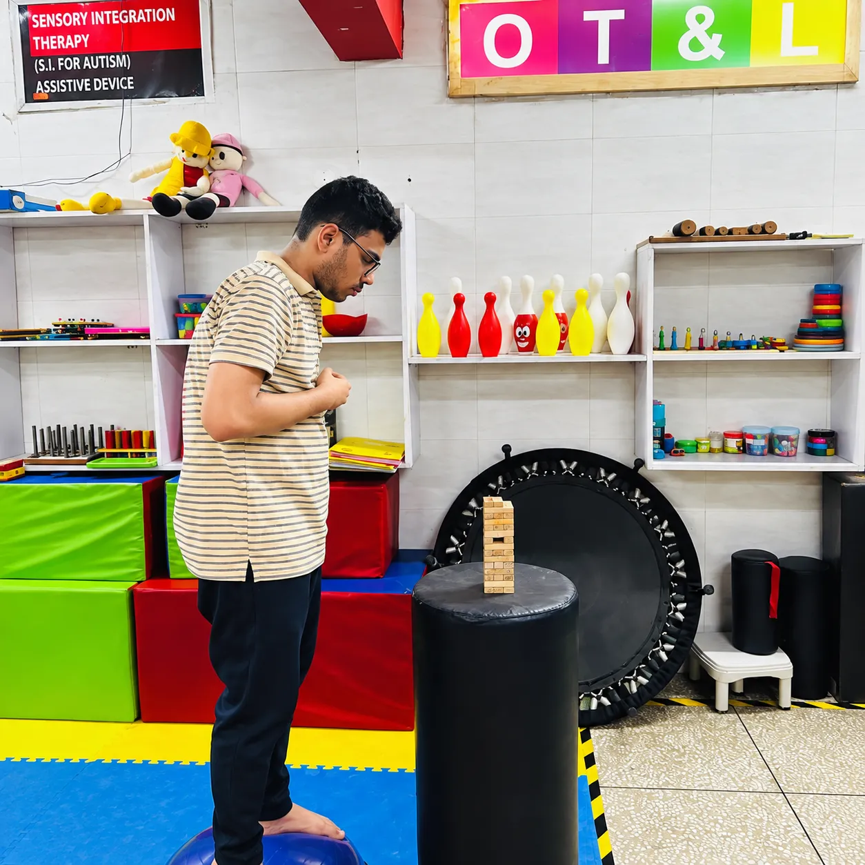 A physiotherapy balance session at OT Cloud Therapy Center.